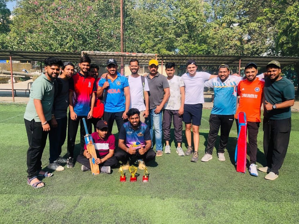 The Cityflo cricket team with the season's trophies