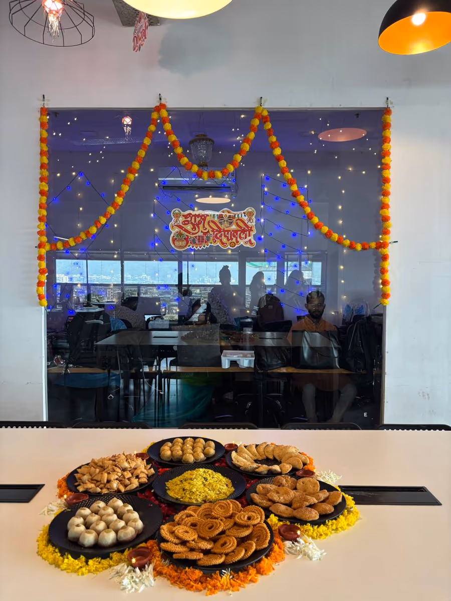 Diwali sweets laid out on the office table